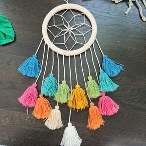 Decorative dream catcher style wall hanging.